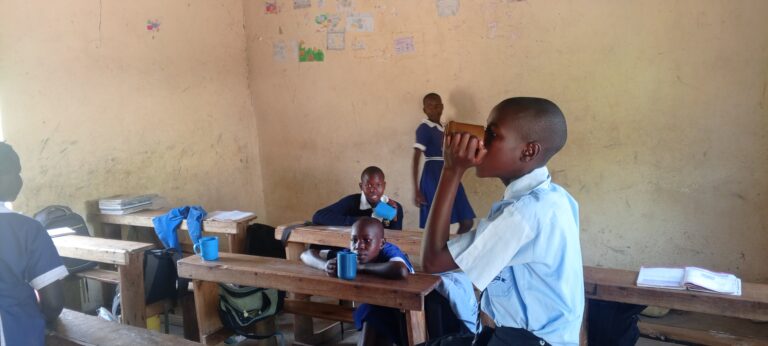 Schoolchildren in Homa Bay, Kenya, supported by Rural to Action's Cup of Hope breakfast program. Photo courtesy of Rural to Action.
