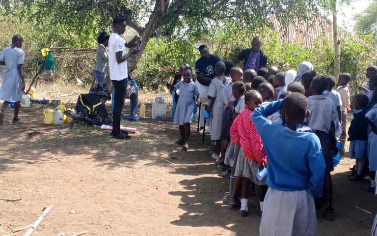 Schoolchildren in Homa Bay, Kenya, supported by Rural to Action's Cup of Hope breakfast program. Photo courtesy of Rural to Action.